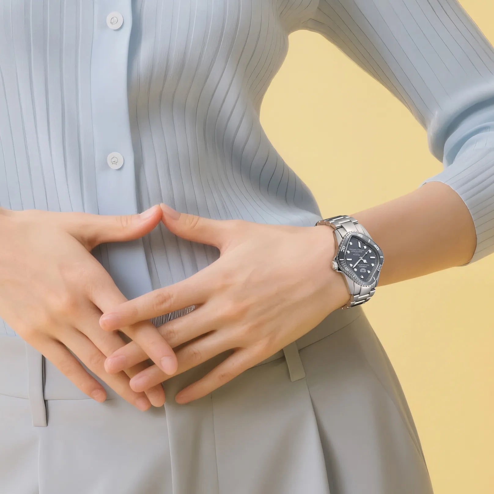 Model wearing Laarvee PEA101-SGRY unisex automatic watch with gray dial and stainless steel bracelet, styled with a pastel top and neutral skirt.